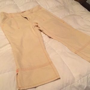 Tan Capri pants with red threading